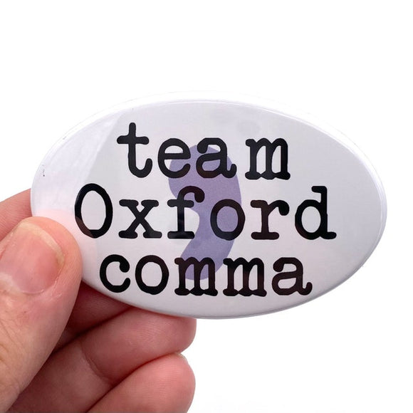 team oxford comma oval magnet