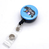 mom hugs bear badge reel