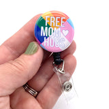 mom hugs flag badge reel