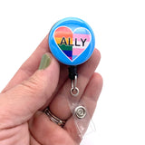 ally heart badge reel