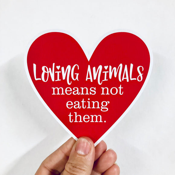 loving animals means not eating them sticker